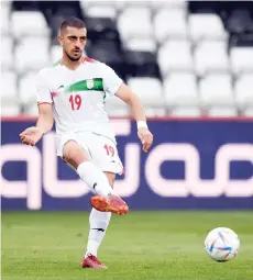  ?? — AFP file photo ?? Iran’s Majid Hosseini plays the ball during the friendly match between Senegal and Iran in Moedling, Austria.