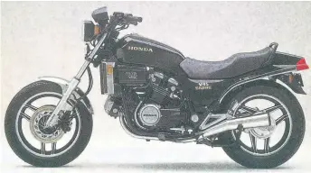  ??  ?? The Honda VF750S (here in US trim) had, in addition to the revolution­ary water-cooled V4 engine, a hydraulica­lly actuated one-way clutch, TRAC anti-dive front suspension and electronic speedo and tachometer and was, in all fairness, not a bad-looking bike.