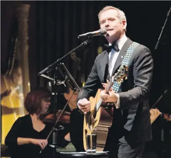  ?? DAVID BAILLIEUL ?? Chris Hadfield performs with the Nova Scotia Symphony. Hadfield, who sings, plays guitar and composes, is best known as the music-loving astronaut who was the first Canadian to walk in space.