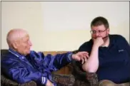  ?? CHARLES PRITCHARD - ONEIDA DAILY DISPATCH ?? Boyd Paquin, left, talks with Madison County Historian Matthew Urtz on Tuesday, May 22, 2018.