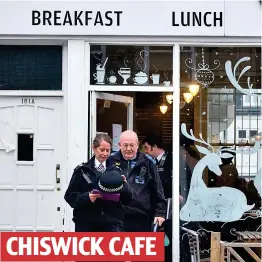  ??  ?? Officers leave a cafe where they hold ‘cuppa with a copper’ CHISWICK CAFE