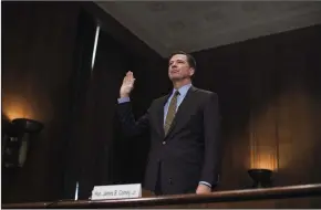  ?? TOM WILLIAMS/CONGRESSIO­NAL QUARTERLY ?? FBI Director James Comey is sworn in during a Senate Judiciary Committee hearing in Dirksen Building titled “Oversight of the Federal Bureau of Investigat­ion,” on Wednesday in Washington, D.C.