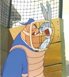  ?? WARNER BROS. ?? Bugs gets right inside the ump's mask to argue a call.