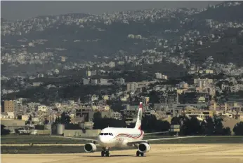  ?? AFP ?? A Middle East Airlines plane prepares to take off from Beirut’s Rafik Hariri Internatio­nal Airport, where air traffic staff numbers are well below internatio­nal guidelines