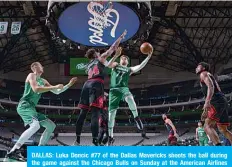  ?? —AFP ?? DALLAS: Luka Doncic #77 of the Dallas Mavericks shoots the ball during the game against the Chicago Bulls on Sunday at the American Airlines Center in Dallas, Texas.