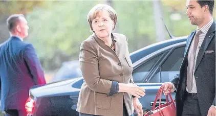  ??  ?? STICKING POINT: Angela Merkel, whose ally Manfred Weber is insisting the UK must make further proposals