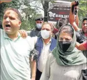  ??  ?? PDP president Mehbooba Mufti, along with supporters, holding a protest; and (right) BJP leaders and workers celebratin­g, on the second anniversar­y of the abrogation of Article 370, in Srinagar on Thursday.