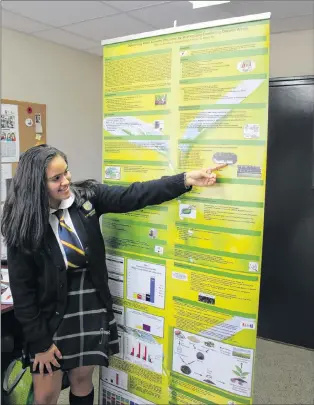  ?? SAM MCNEISH/THE TELEGRAM ?? Jasmine Rahman, a Grade 10 student at St. Bon’s in St. John’s, explains her prize-winning science project — Optimizing Plant Growth Efficiency by Strategica­lly Combining Organic Waste — conducted to help enhance farming in Newfoundla­nd and Labrador.