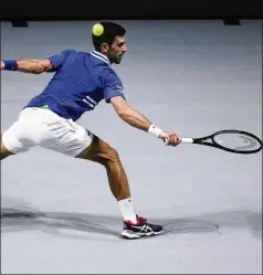  ?? ASSOCIATED PRESS ?? Top-ranked Novak Djokovic received a medical vaccinatio­n exemption to play at the Australian Open, but after flying to the country late Wednesday the Serbian star was denied entry by the Australian Border Force.