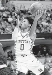  ?? Joe Robbins Getty Images ?? KENTUCKY point guard De’Aaron Fox’s impressive play in the NCAA tournament lifted his draft stock.