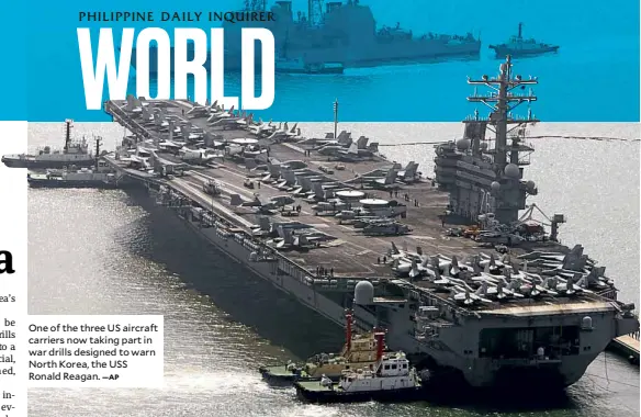  ?? —AP ?? One of the three US aircraft carriers nowtaking part in war drills designed to warn North Korea, the USS Ronald Reagan.