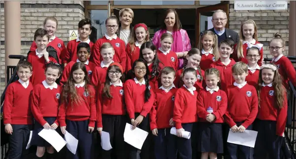  ??  ?? Members of the Scoil Mhuire choir who were singing at the Confirmati­ons for St Anne’s and Rathmichae­l School in Shankill, with Julie Lowry, Principal Patricia Slavin and Rev John O’Connor