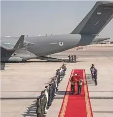  ?? WAM ?? Left: First Corporal Saeed Mattar Ali Al Kaabi’s body is received at a special military ceremony held at Al Bateen Executive Airport in Abu Dhabi yesterday.