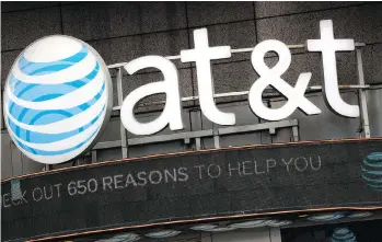  ?? MARK LENNIHAN/AP FILES ?? The U.S. Justice Department has launched a legal battle to prevent the merger of AT&T and Time Warner over worries the deal would cause consumer cable bills to increase. AT&T argued that buying Time Warner would let it package and deliver video more...