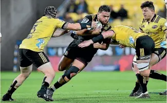  ?? PHOTO: GETTY IMAGES ?? Chiefs prop Angua Ta’avao (centre) has gone public with his own mental health issues.