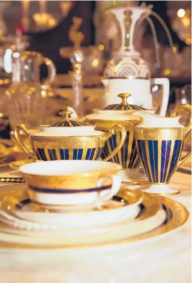  ?? NAIMA GREEN/THE NEW YORK TIMES ?? The inventory at Elise Abrams Antiques in Great Barrington, Massachuse­tts. More dining at home has led some people to seek out fancier tableware that makes everyday meals feel far more celebrator­y.