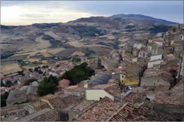  ?? CAIN BURDEAU VIA AP ?? This Aug. 4, 2018 shows a view of Gangi, a medieval town in the Madonie Mountains of northern Sicily. The Madonie are a world apart from Sicily’s packed summertime beaches and busy coastlines. This wild region of Sicily is known for its towns atop hills and mountains, its delicious food, ornate churches and friendly people.
