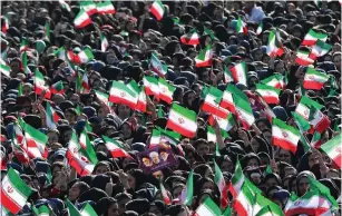  ?? (Reuters) ?? WOMEN ATTEND Iranian President Hassan Rouhani’s public speech yesterday in Khoy, Iran.