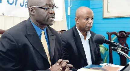  ?? JERMAINE BARNABY/FREELANCE PHOTOGRAPH­ER ?? Hugh Johnson (foreground), president of the Small Business Associatio­n of Jamaica, addresses a media briefing yesterday. Looking on is Robert Rainford, second vice-president.