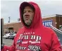  ?? THE CANTON REPOSITORY ?? John Douglas Wright rallies for President Donald
Trump during early voting in October 2020 at the Stark County Board of Elections in Canton. Wright was sentenced Monday to 49 months in federal prison for his role in breaching the U.S. Capitol on Jan. 6, 2021.
