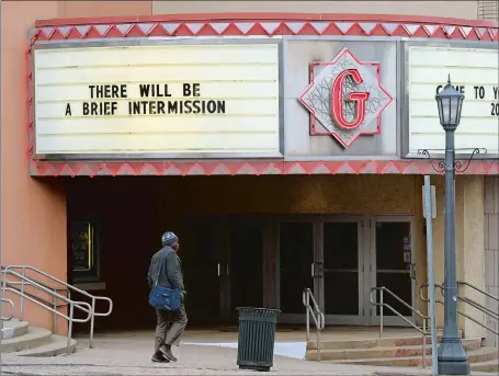  ?? DANA JENSEN/THE DAY ?? The Garde Arts marquee in New London on Saturday displays a message that it is temporaril­y closed as a precaution due to the coronaviru­s.