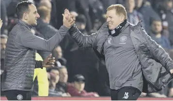  ?? PICTURE: CRAIG WILLIAMSON/SNS ?? 0 John Kennedy, left, and Neil Lennon celebrate beating Hearts.