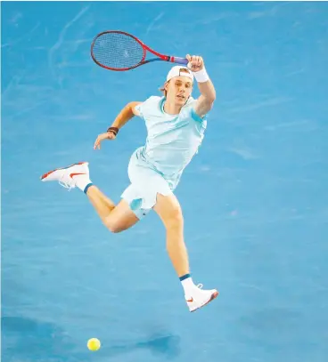  ?? ASANKA BRENDON RATNAYAKE / REUTERS ?? Canada’s Denis Shapovalov in action during his first round match against Italy’s Jannik Sinner at the Australian Open. It took nearly four hours, but Shapovalov
advanced to the second round with a win in five sets.