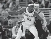  ?? DYLAN BUELL TNS ?? New York’s Josh Hart, guarding Indiana’s Pascal Siakam on Sunday, had just two points and two rebounds in 24 minutes in Game 4, a 121-89 win by the Pacers.