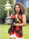  ?? PHOTO: GETTY IMAGES ?? Mine . . . Naomi Osaka, of Japan, poses with the Daphne Akhurst Memorial Trophy at Government House in Melbourne, Australia, yesterday after winning the 2021 Australian Open Women’s Final on Saturday.