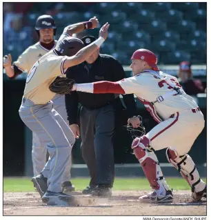  ?? NWA Democrat-Gazette/ANDY SHUPE ?? Arkansas catcher Grant Koch (right) tags Louisiana-Monroe center fielder Braedon Barrett at home plate as he attempts to score on a wild pitch from starter Caleb Bolden on Wednesday during the third inning of the Razorbacks’ 4-0 victory over the...