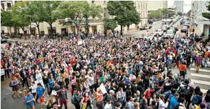  ?? AP/PTI ?? Anti-trump protesters march along Congress Avenue in Austin, Texas, on Wednesday