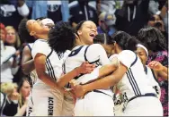  ?? Christian Abraham / Hearst Connecticu­t Media file photo ?? Hillhouse celebrates its win over Daniel Hand during Class L girls basketball championsh­ip action in Uncasville on March 16, 2019.