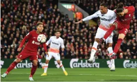  ?? Photograph: Peter Powell/EPA ?? Darwin Núñez rises above West Ham’s Thilo Kehrer to power in the only goal of the night at Anfield.