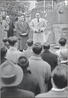 ?? / AP, File ?? Jacob DeShazer who was one of the Doolittle airmen who raided to Tokyo, holds an outdoor missionary meeting in Tokyo, Nov. 28, 1949. DeShazer, shot down in the raid, was picked up by the Japanese and held as a prisoner of war. On his return to the U.S. he studied to be a missionary in order to teach the Japanese “a new way of life.”