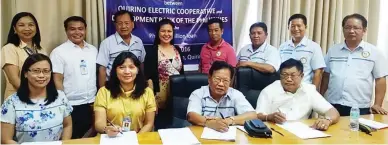  ??  ?? LOAN SIGNING – Shown during the signing of loan documents between DBP and QUIRELCO are (seated, from left): DBP business developmen­t officer Imelda F. Eisma; DBP senior assistant vice president Catherine T. Camarao; QUIRELCO chairman, Engr. Warlito C....