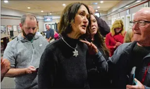  ?? TIM COOK/THE DAY ?? Republican state Rep. Holly Cheeseman of the 37th District celebrates her victory Tuesday at Flanders Fish Market in East Lyme.