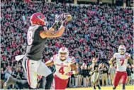  ?? JOHN PAUL VAN WERT/GEORGIA PHOTO ?? Georgia tight end Isaac Nauta had 29 receptions as a freshman, including this 9-yard touchdown in the 35-21 victory over Louisiana-Lafayette.