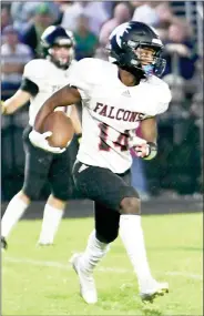  ?? PILOT PHOTO/BEV HARAMIA ?? Glenn’s Ty’ronn Larkin makes the intercepti­on here and ran it back for a Falcon touchdown.