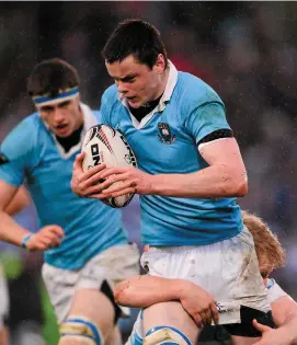  ??  ?? Current Ireland second-row James Ryan on the charge for St Michael’s College in the 2013 Leinster Schools Senior Cup Final against Blackrock