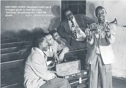  ?? Picture: JÜRGEN SHADEBERG ?? HISTORIC HORN: Masekela holds up a trumpet given to him by Louis ‘Satchmo’ Armstrong in a 1955 file photo