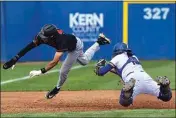  ?? PHOTOS BY ELIZA GREEN / THE CALIFORNIA­N ?? Cal State Bakersfiel­d catcher James Bell lunges to tag out Pacific’s Tony Otis during Monday afternoon’s game.