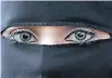  ?? | ANA Archives ?? MUSLIM women wearing headscarve­s, or Niqab, in France will face a trip to the police station and a fine if they refuse to abide by a ban on the traditiona­l garments from April this year.