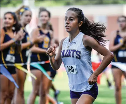  ?? File photo by Jerry Silberman / risportsph­oto.com ?? After finishing second in her race at the Injury Fund carnival, St. Raphael junior Rachael Mongeau started the Metropolit­an Division season off with an impressive 17-minute, 2-second performanc­e in Tuesday’s meet at Slater Park.