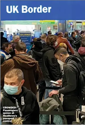  ??  ?? CROWDED: Passengers queue at Heathrow’s passport control