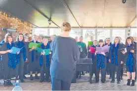  ?? ?? Donna Higham conducts the Woolshed Warblers at the 75th celebratio­n of Waipa King Country Rural Women NZ.