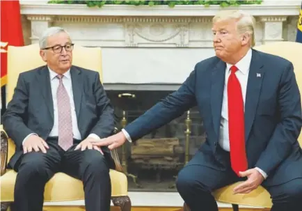  ?? Evan Vucci, The Associated Press ?? President Donald Trump and European Union Commission President Jean-Claude Juncker met Wednesday at the White House. The tone between Trump and Juncker, who agreed to hold off on new tariffs, was friendly. Trump said the EU agreed to buy “a lot of soybeans” and increase its imports of liquefied natural gas from the U.S.