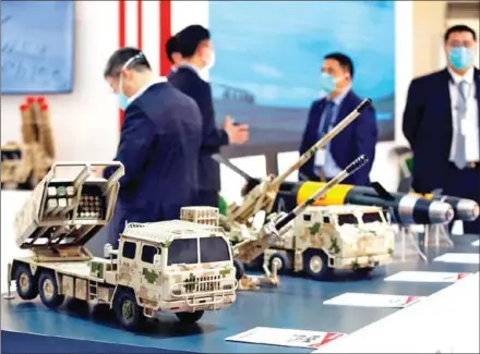  ?? AFP ?? Models of weapons are seen during the 10th edition of the Baghdad security, defence and military industry fair organised on the premises of the Baghdad internatio­nal exhibition complex in the Iraqi capital on March 2.