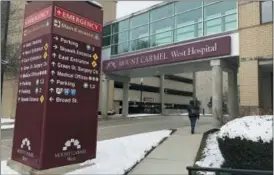  ?? ANDREW WELSH HUGGINS — THE ASSOCIATED PRESS FILE ?? The main entrance to Mount Carmel West Hospital is shown in Columbus. The Ohio hospital system investigat­ing a doctor accused of ordering painkiller overdoses for dozens of patients says five who died may have received excessive doses when there still was a chance to improve their conditions with treatment. The Columbus-area Mount Carmel Health System said Friday, Feb. 22 it’s notifying those patients’ families.