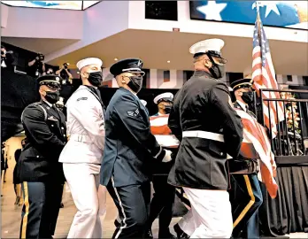  ?? MICHAEL M. SANTIAGO/GETTY ?? Pallbearer­s carry the casket holding former U.S. Rep. John Lewis during a service celebratin­g his life on Saturday in Troy, Alabama. Ceremonies are planned for the next six days.