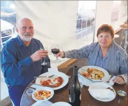  ?? Emily M. Olson / Hearst Connecticu­t Media ?? Restaurant­s were allowed to open Wednesday for outside dining. At the Venetian Restaurant in Torrington, Jim Upton and Marlene Newman, of Harwinton, were enjoying their first night out in months.